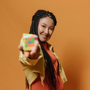 Portrait of Daryna, a smiling woman in her 40s.
