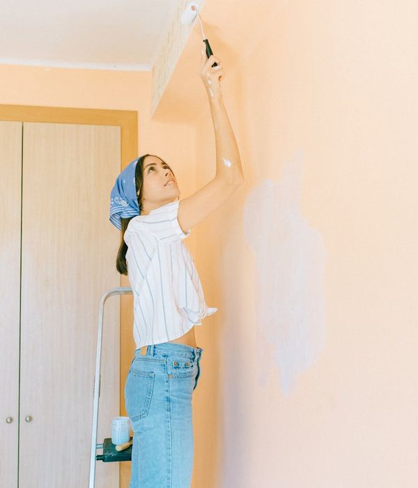 Woman feeling energetic and balanced in a bright room.